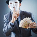 Businessman with money and mask