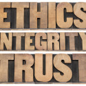 ethics, integrity, trust word - a collage of isolated text in vintage letterpress wood type printing blocks